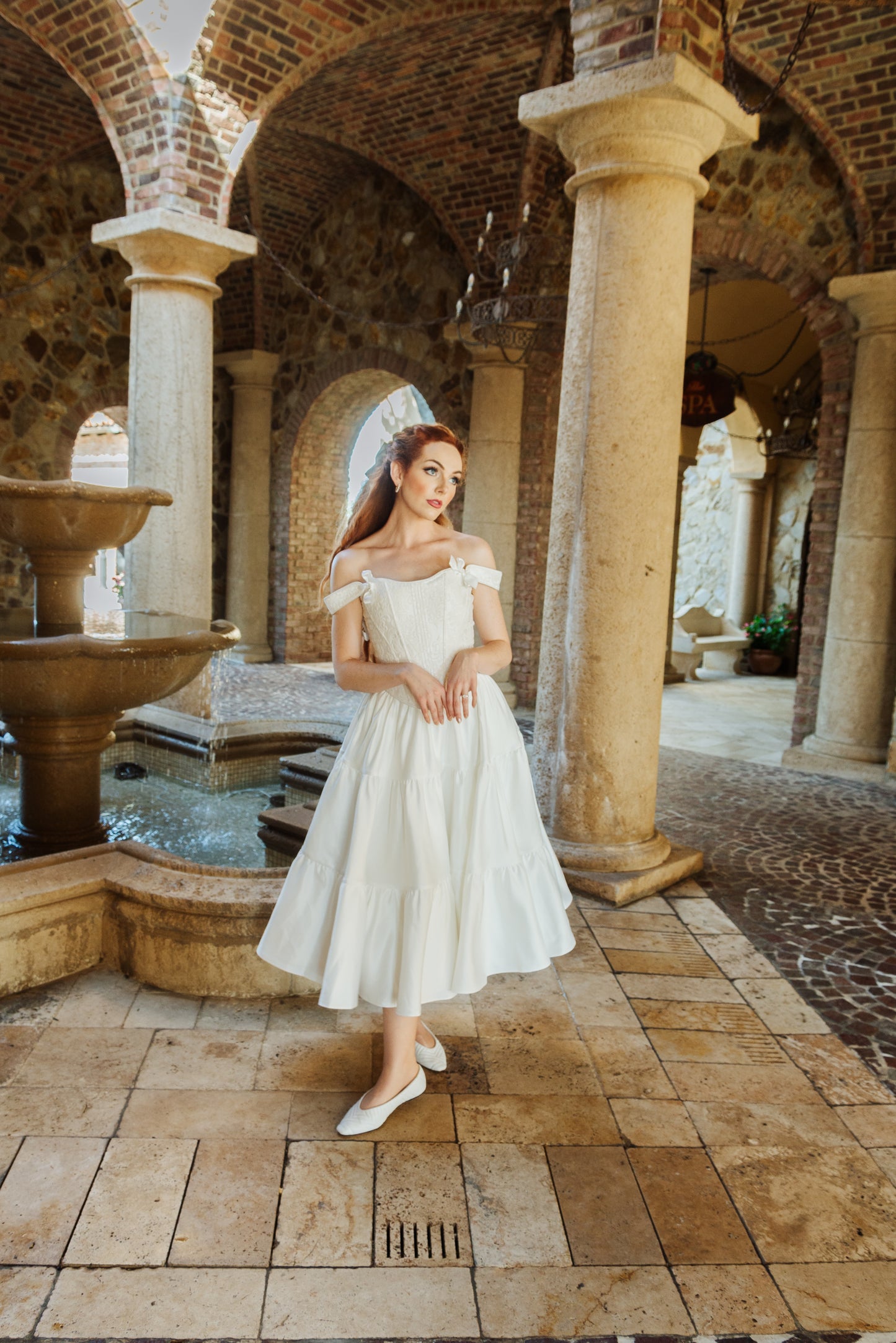 Bride posing with ivory Bridal Madonna Skirt gently swaying