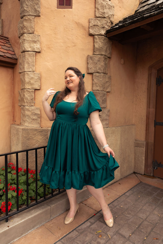 Novella dress in tourmaline teal at a castle setting