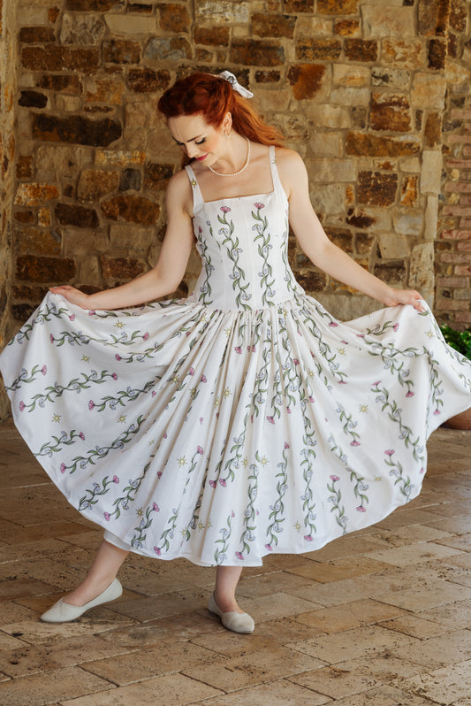 Woman twirling in the Ophelia Dress, highlighting the fullness of the skirt